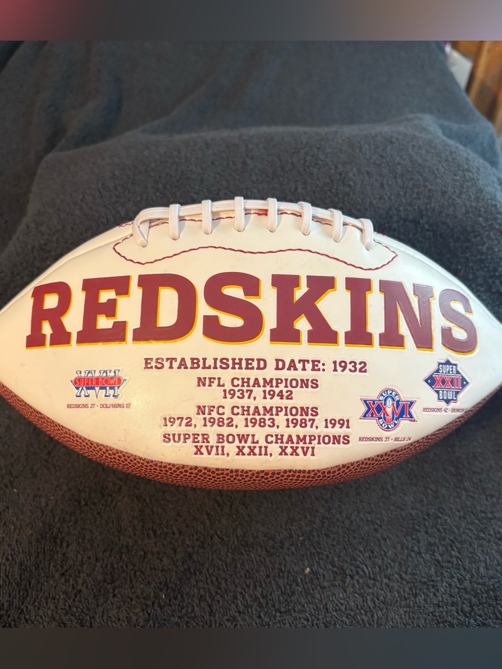 Authentic Washington Redskins Football autographed By Team Members.